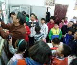 北京慈善艺术院组织书画家义务支教延庆县