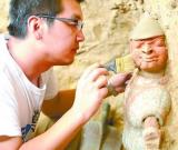 山西大同发现北魏石椁墓 出土彩陶随葬品